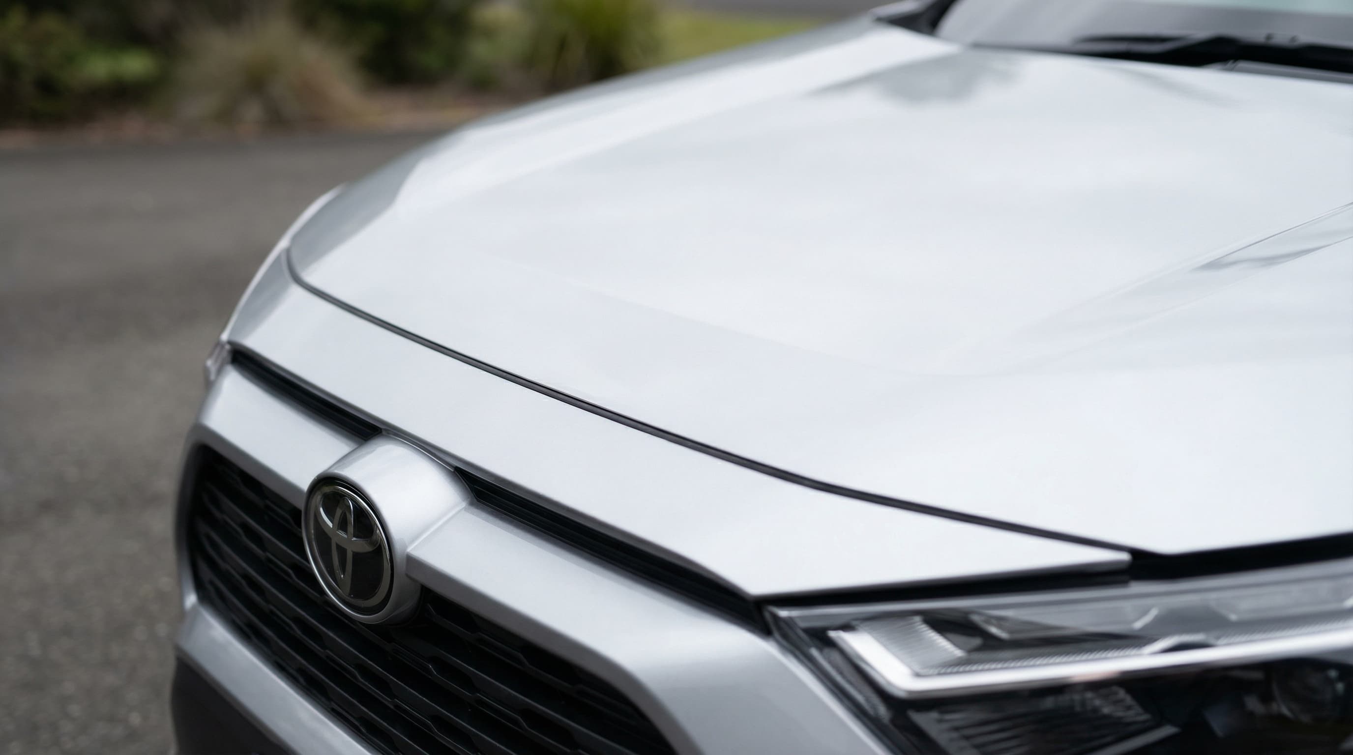 Close-up of silver Toyota RAV4 bonnet leading edge with PPF — completely pristine