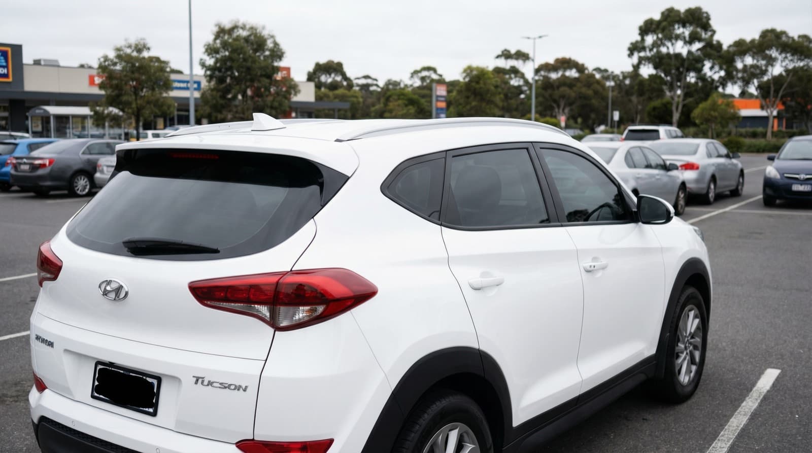 White SUV with tinted windows by Solarblock Gosford